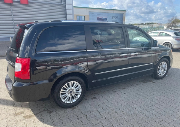 Lancia Voyager cena 53500 przebieg: 210000, rok produkcji 2013 z Warszawa małe 137